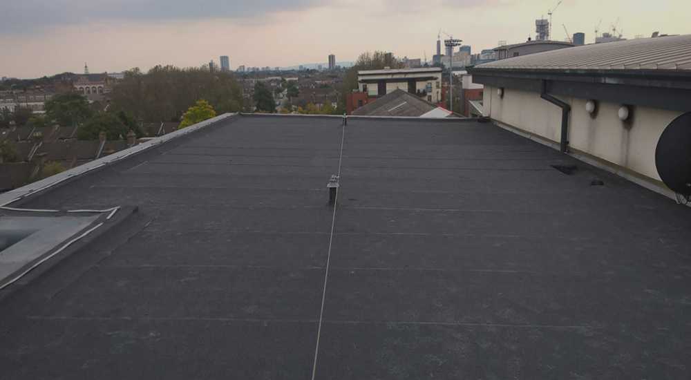 Flat roof repair work on a Scottish property